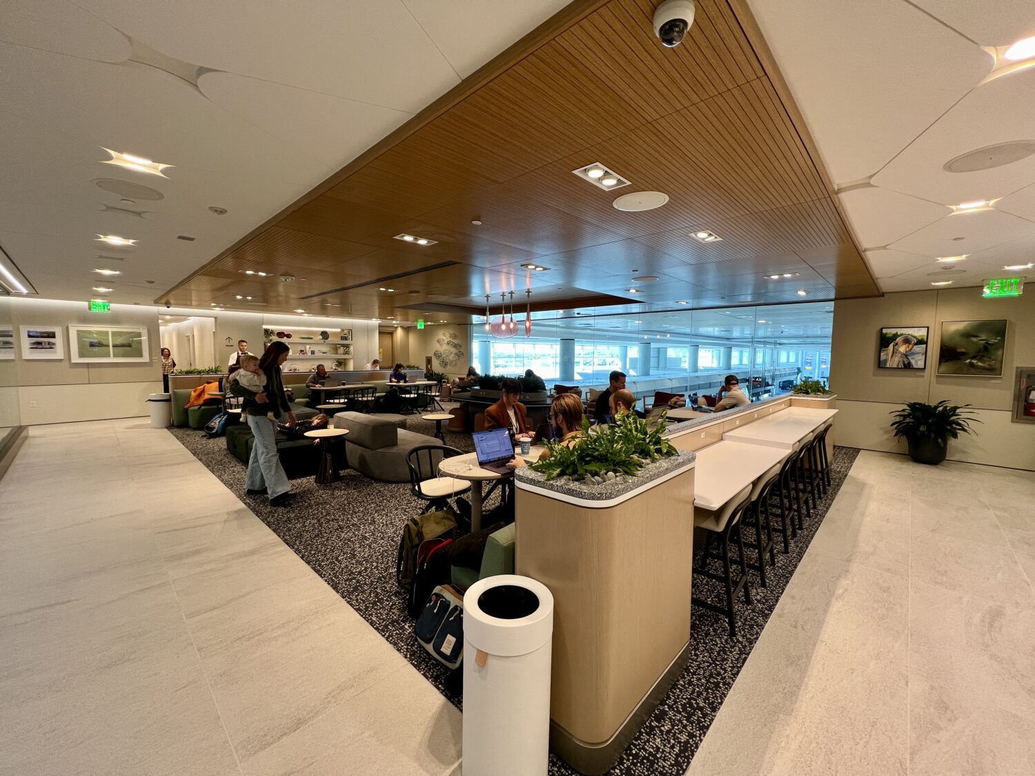 seating area inside capital one lounge denver